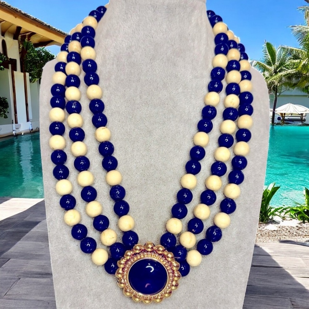 Vintage Monet Three Strand Necklace with Gold and Blue pendant 20”